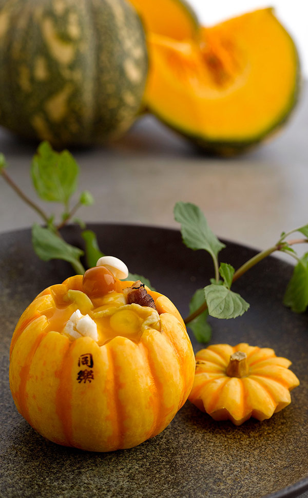 Double boiled Abalone with Seafood, Sliced Ham and Cream of Pumpkin served in Mini Pumpkin